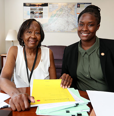 Secretary of Administration Grindly Johnson (left) and Whitney Brown